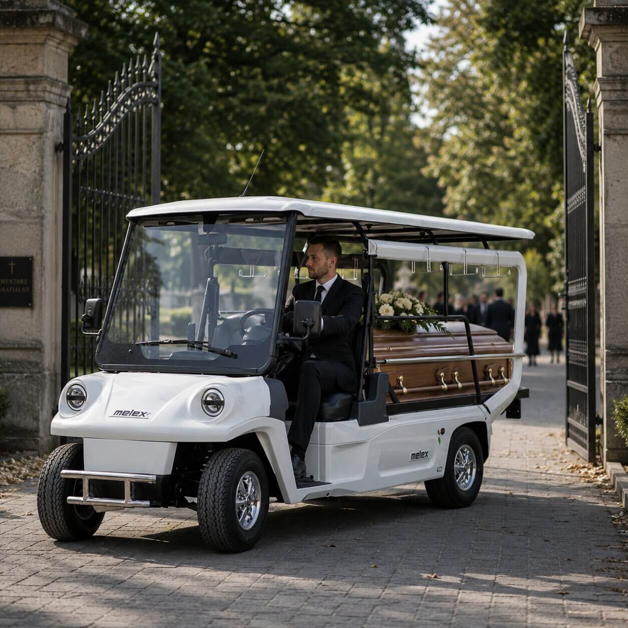 Melex Karawan elektryczny z ruchomym podestem do transportu trumien